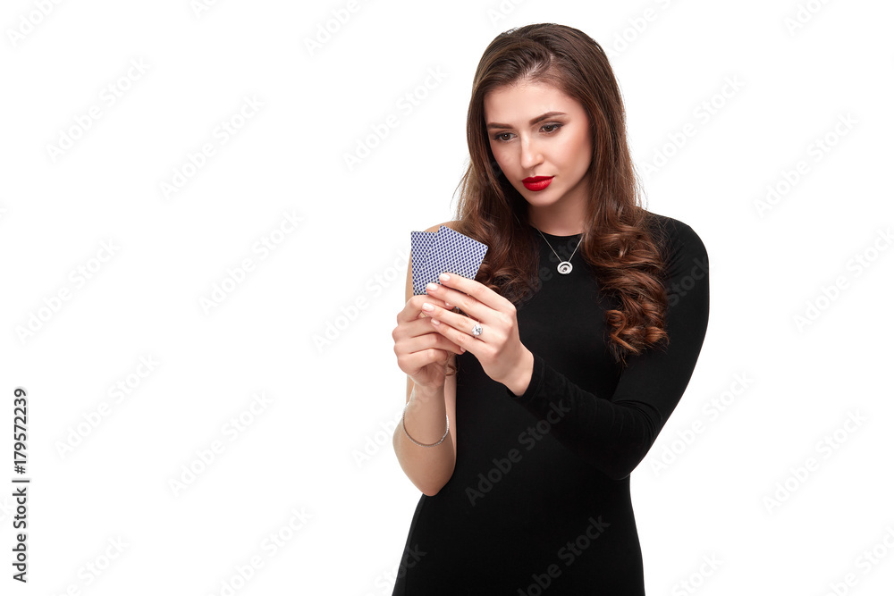 Sexy curly hair brunette posing with two aces cards in her hands, poker concept isolation on white background Sexy curly hair brunette posing with two aces cards in her hands, poker concept isolation on white background