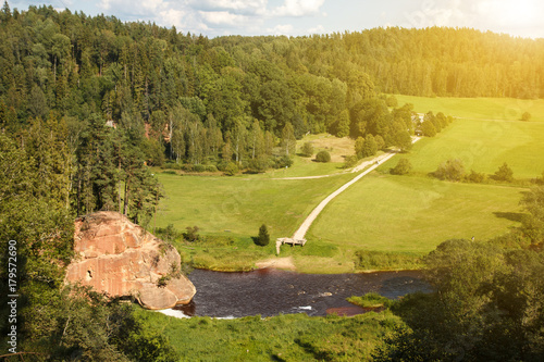 The Zvartes Rock is one of the most popular and scenic sandstone outcrops in Latvia. It is located on the left bank of the Amata River in the Gauja National Park. photo