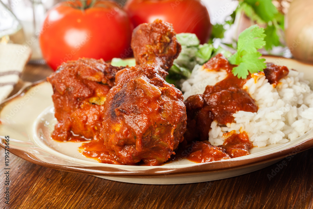 Fototapeta premium Chicken drumstick curry with rice