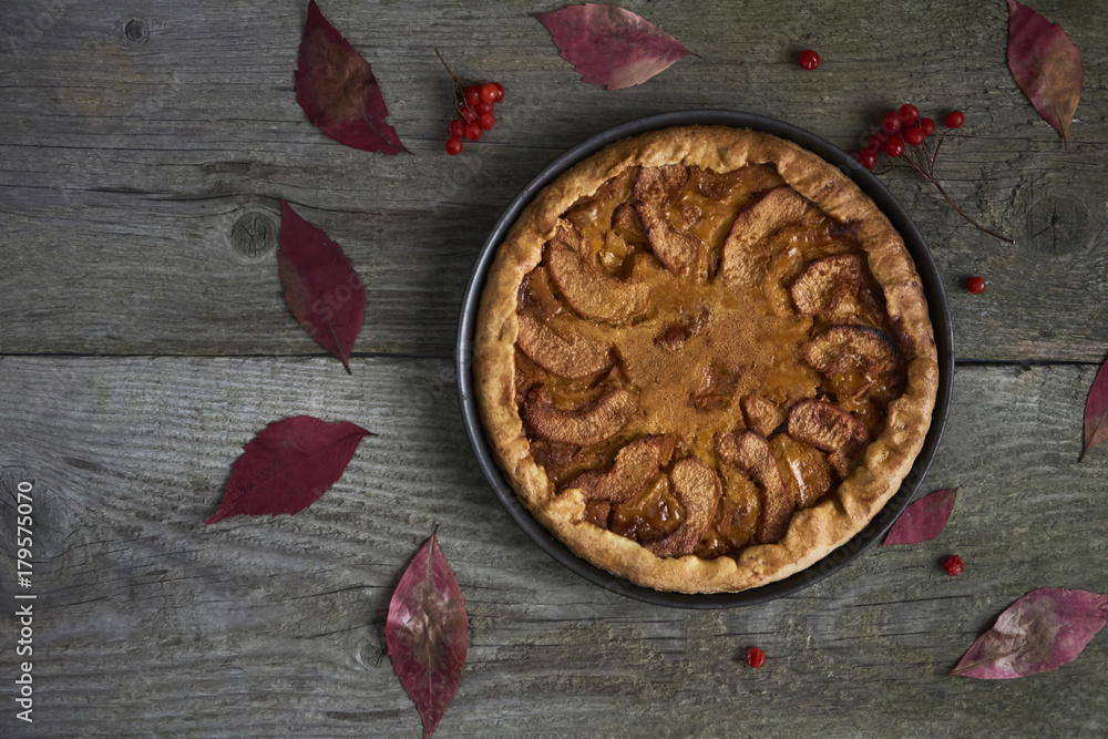 Homemade apple quince pie with fresh fruits on rustic wooden background. Top view Homemade apple quince pie with fresh fruits on rustic wooden background. Top view