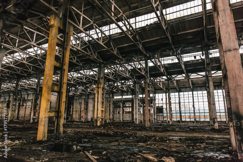 Abandoned metallurgical excavator plant or factory interior  industrial warehouse building waiting for a demolition