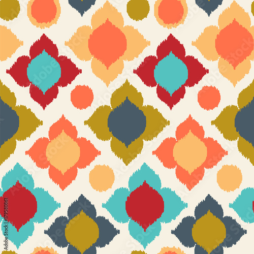 Seamless vector pattern with bright ikat background. 