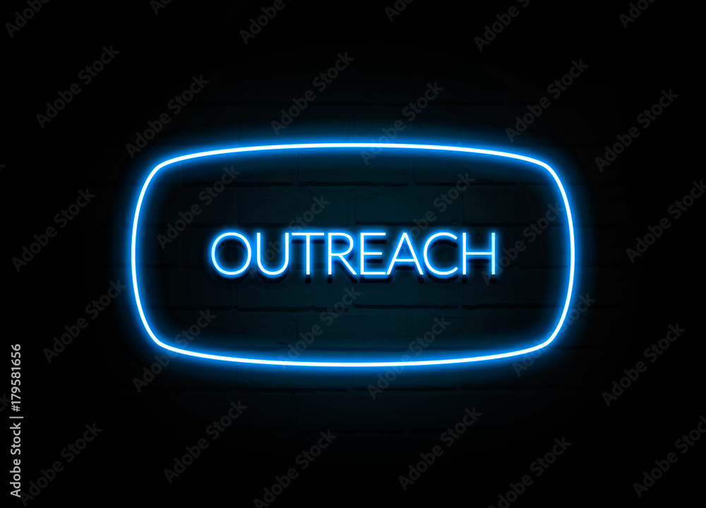 Outreach - colorful Neon Sign on brickwall Outreach - colorful Neon Sign on brickwall