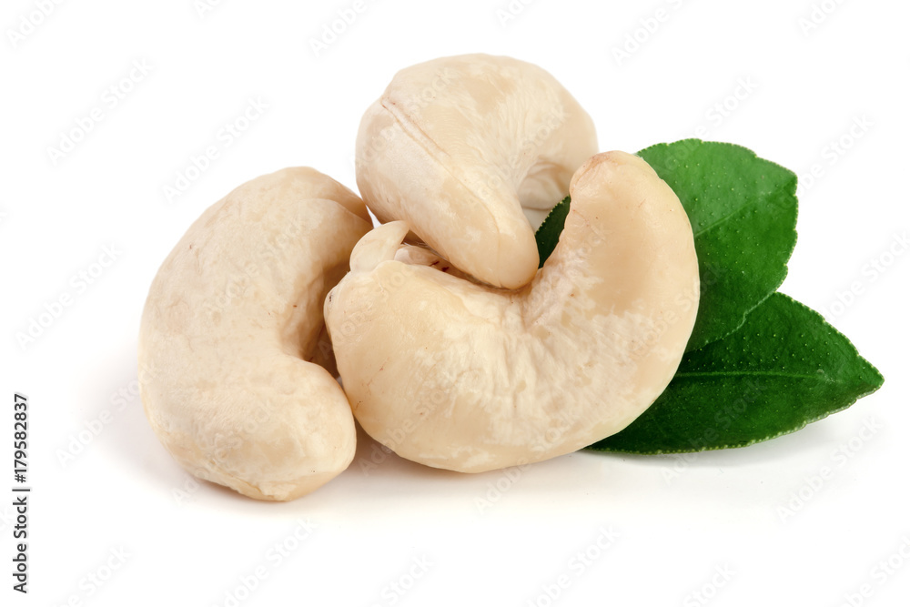 cashew nuts with leaf isolated on white background. macro cashew nuts with leaf isolated on white background. macro