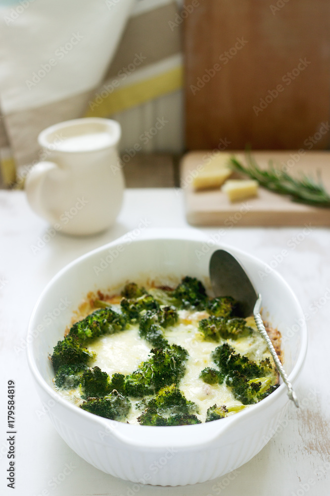 Casserole with broccoli, cauliflower and cheese on a light background. Casserole with broccoli, cauliflower and cheese on a light background.