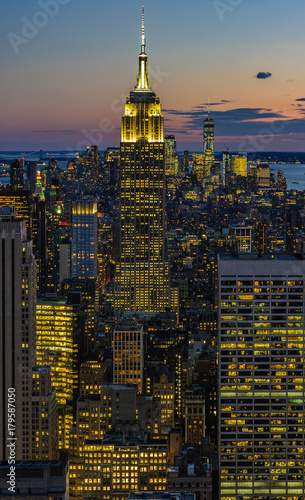 Canvas Print City skyline and Empire State Building at night in NYC, USA