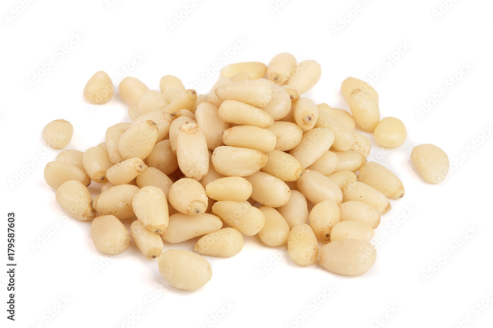 Shelled cedar pine nuts isolated on white background Shelled cedar pine nuts isolated on white background