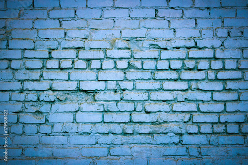 Brick wall. The brick wall painted in blue