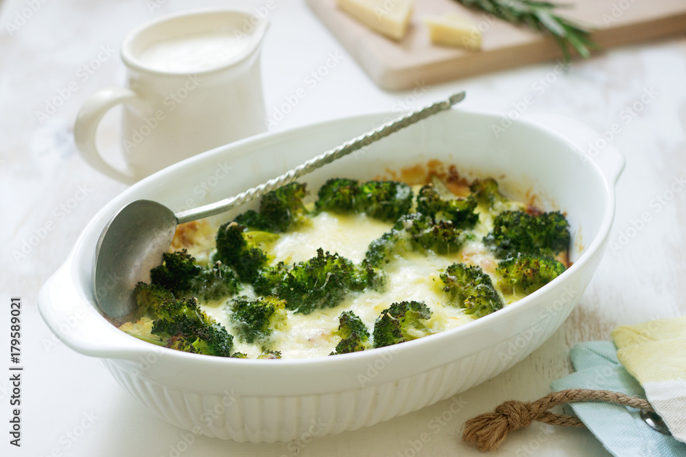 Casserole with broccoli, cauliflower and cheese on a light background. Casserole with broccoli, cauliflower and cheese on a light background.