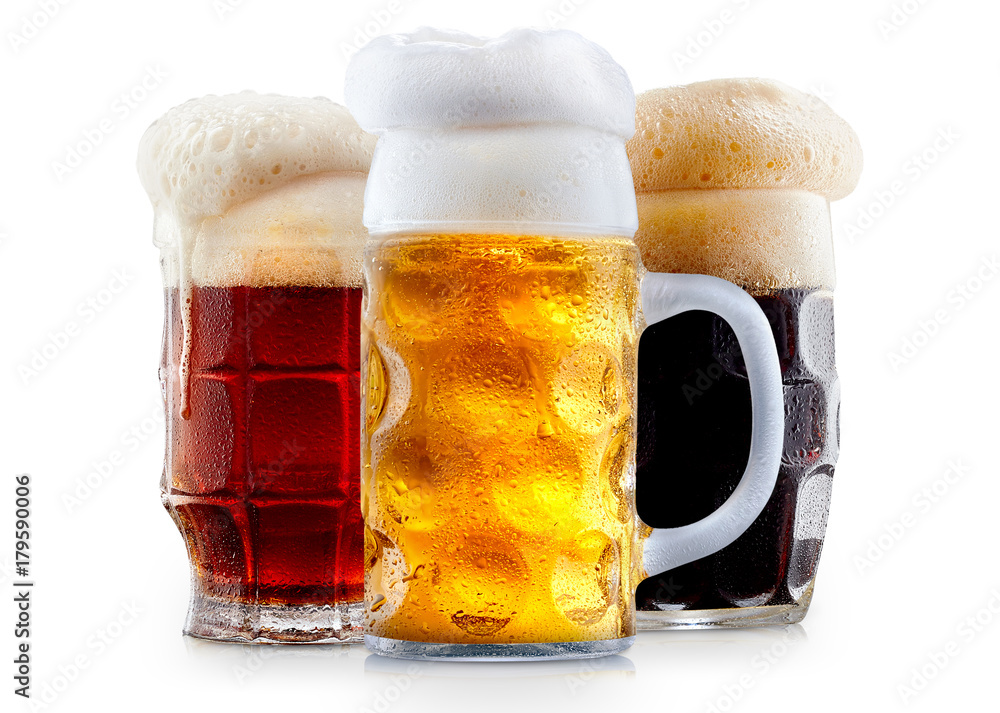 Mug collection of frosty dark red and light beer with foam isolated on a white background