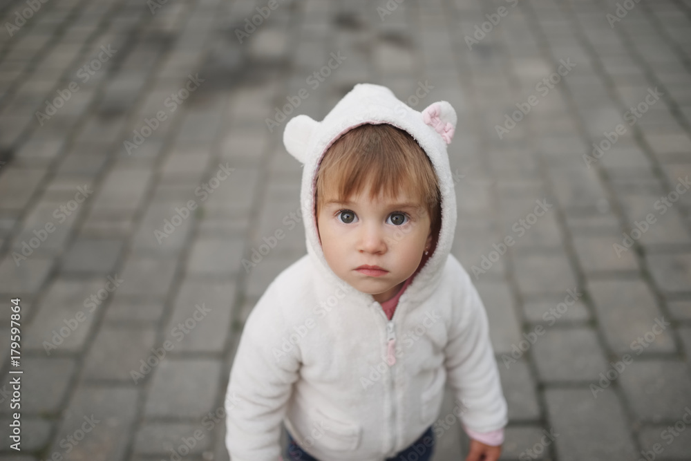 cute little girl in hood with ears cute little girl in hood with ears