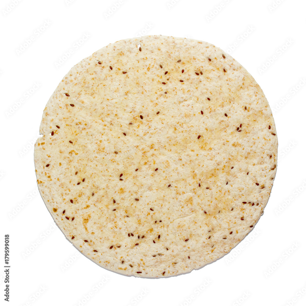 Wheat tortilla with seeds of cereals on white isolated background Wheat tortilla with seeds of cereals on white isolated background