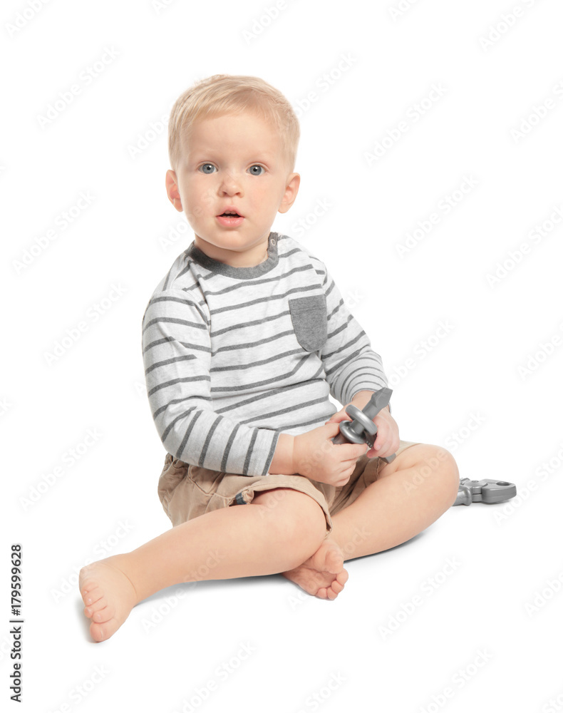 Cute little baby with toys, isolated on white Cute little baby with toys, isolated on white
