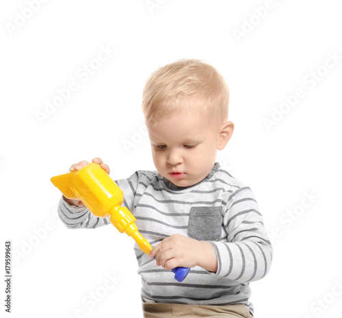 Cute little baby with toys,...