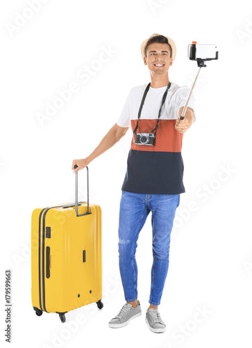 Attractive male tourist tak...