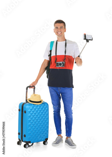 Attractive male tourist tak...