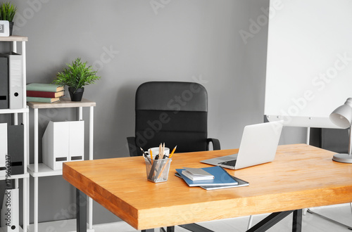 Comfortable workplace in light room
