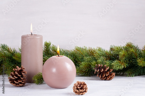 Candles for cold weather. Christmas celebration or cold winter concept with copy space