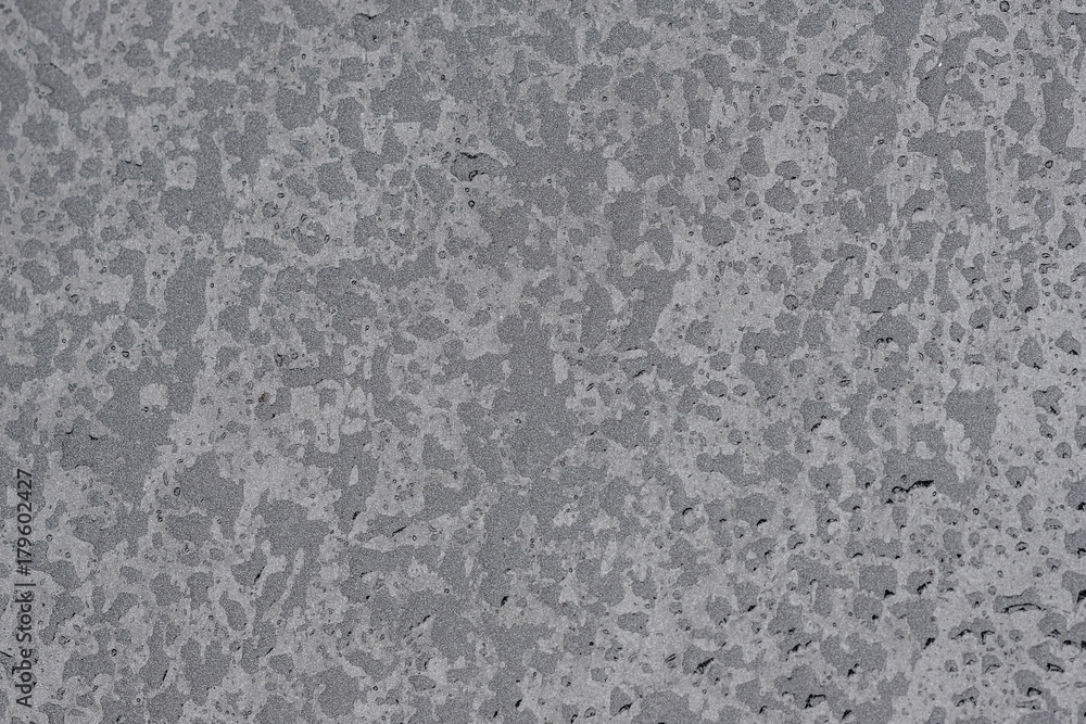 Drops of water on a gray surface Drops of water on a gray surface
