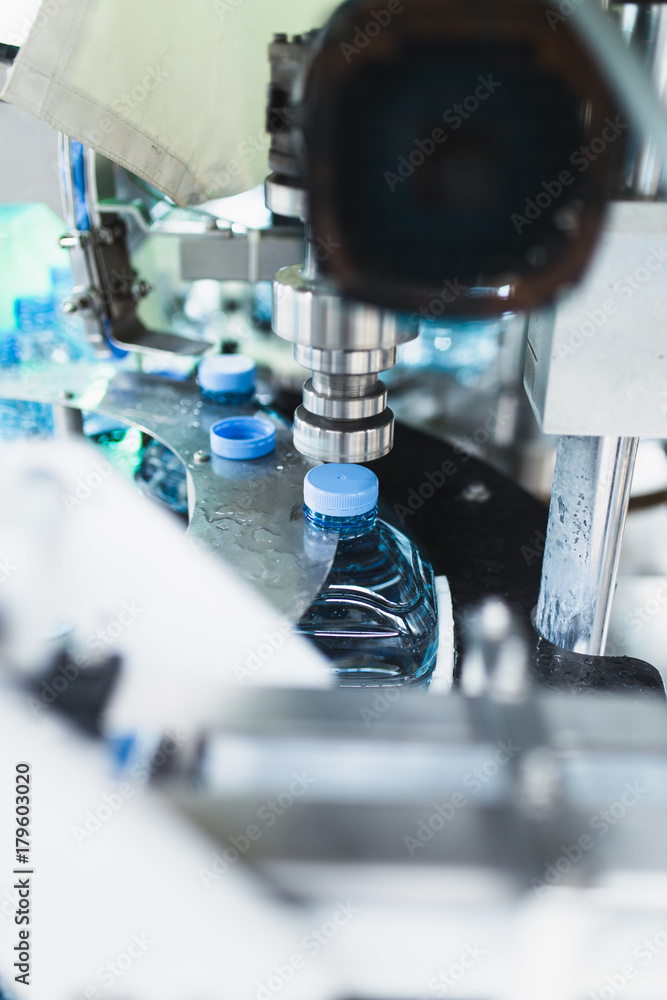 Bottling plant - Water bottling line for processing and bottling pure mineral carbonated water into bottles. Bottling plant - Water bottling line for processing and bottling pure mineral carbonated water into bottles.