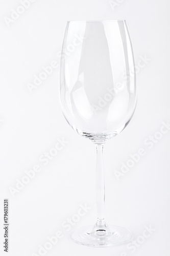 Empty wine glass on white background. Wine glass isolated on white.