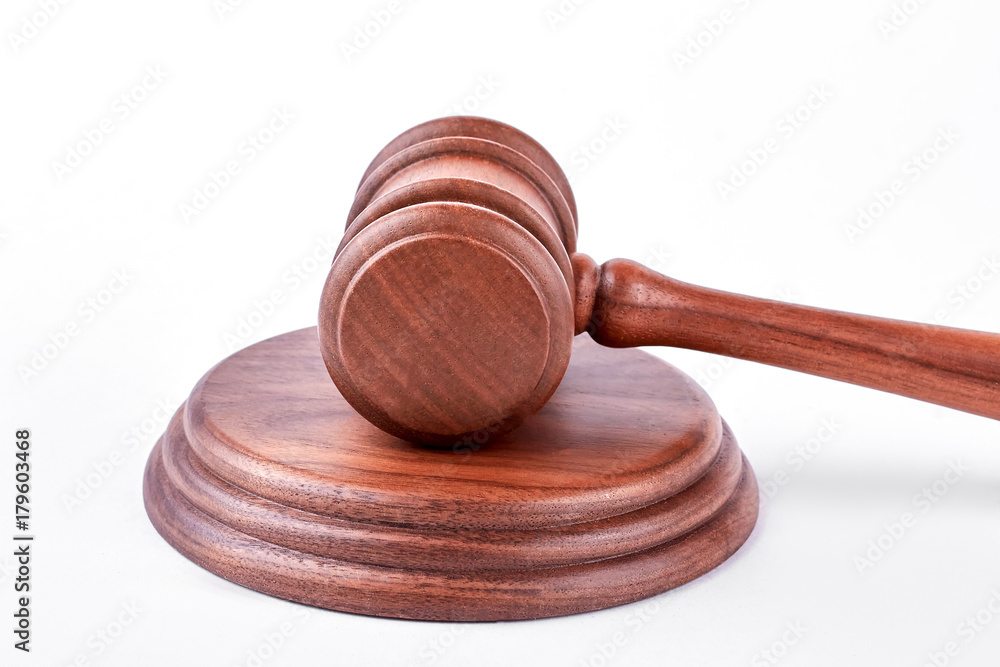 Wooden gavel on white background. Judge gavel and stand on white background. Law, business and auction.