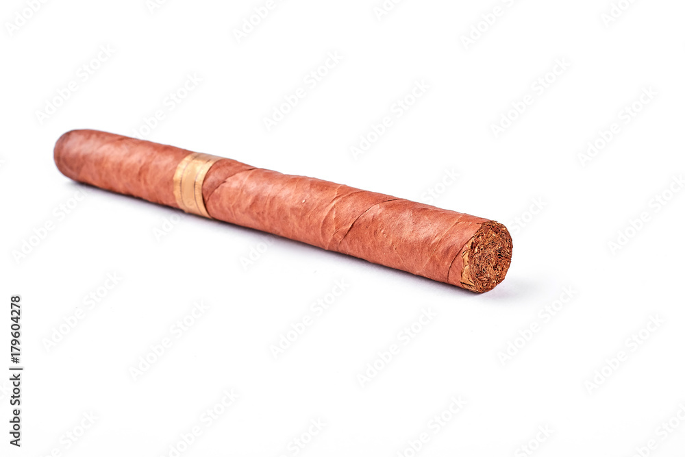 Cuban cigar isolated on white background. Original cuban cigar on white background. Cuban cigar isolated on white background. Original cuban cigar on white background.