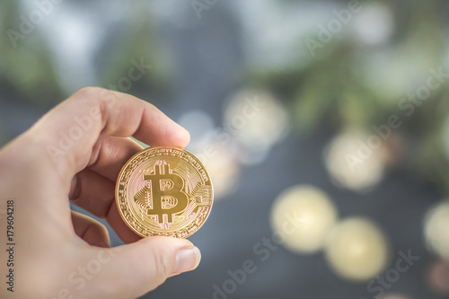 Hand Holding Golden Bitcoin Virtual Money Cryptocurrency
