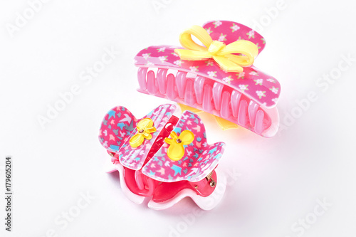 Pink plastic hair clips with bow. Kids beautiful design clips for hair. Girls hair accessory.