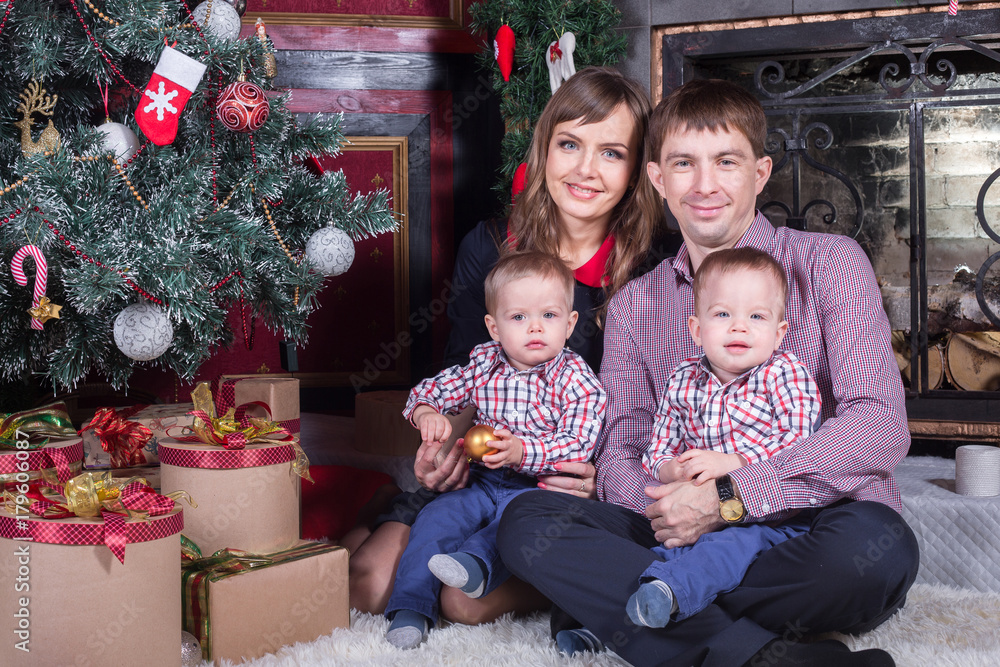 Happy family celebrating Christmas Happy family celebrating Christmas