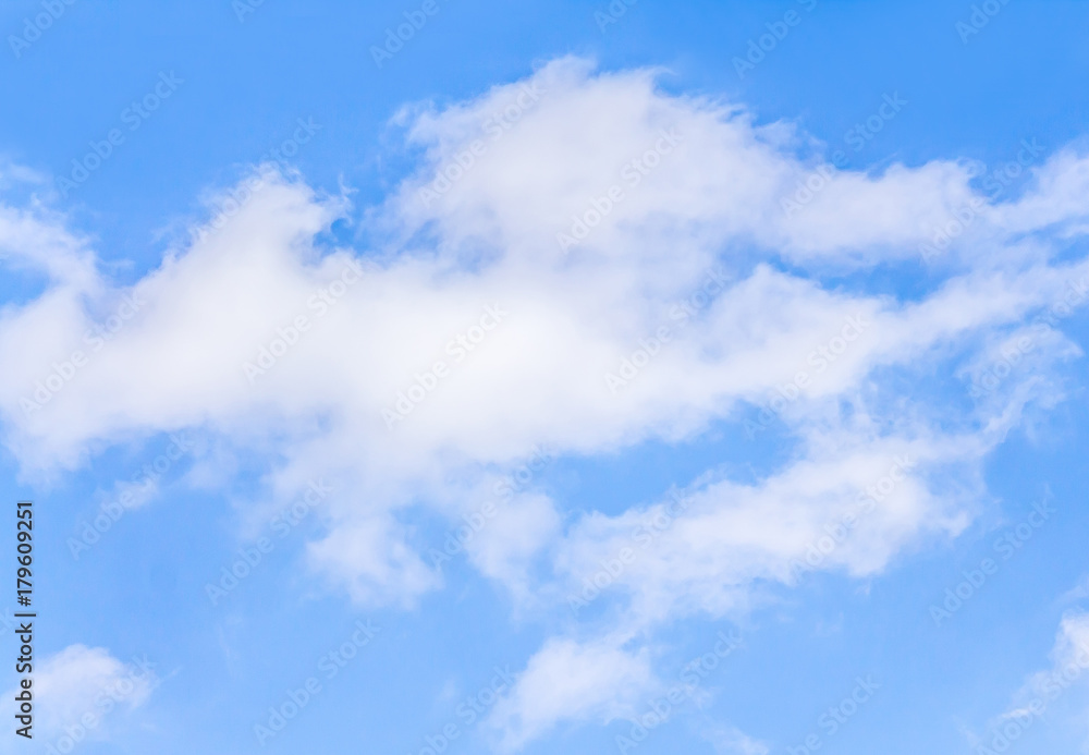 White clouds against blue sky as background for design White clouds against blue sky as background for design