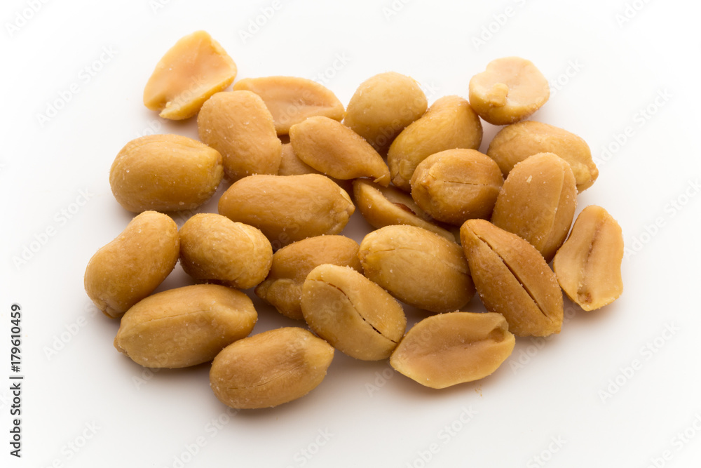 Peeled peanuts on the isolated background. Peeled peanuts on the isolated background.