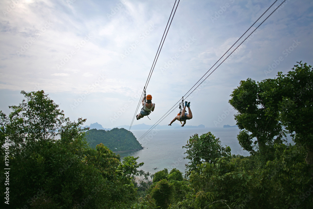 custom made wallpaper toronto digitalZiplining on a zip wire connecting Las Cabanas beach in El Nido and Depeldet Island, on Palawan, The Philippines