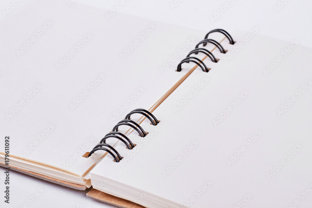 Craft paper notebook close up. Open empty notepad with clipping path. Paper blank notebook. Craft paper notebook close up. Open empty notepad with clipping path. Paper blank notebook.
