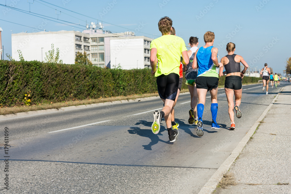 Fototapeta premium Marathong runners running a race.
