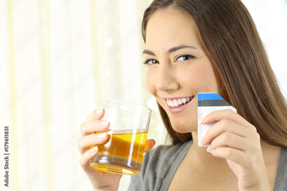 Woman posing with soluble medicine at home Woman posing with soluble medicine at home