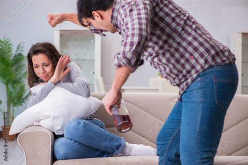 Domestic violence concept in a family argument with drunk alcoho