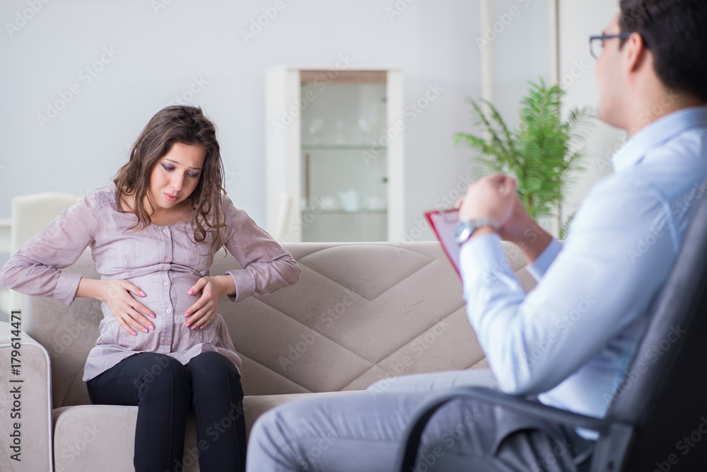 Pregnant woman visiting psychologist doctor Pregnant woman visiting psychologist doctor
