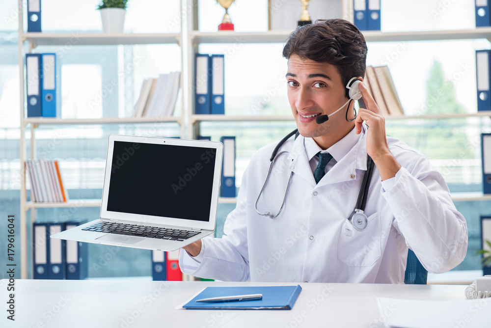 Young male doctor in telehealth concept Young male doctor in telehealth concept