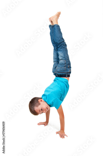 Photography Young boy doing handstand
