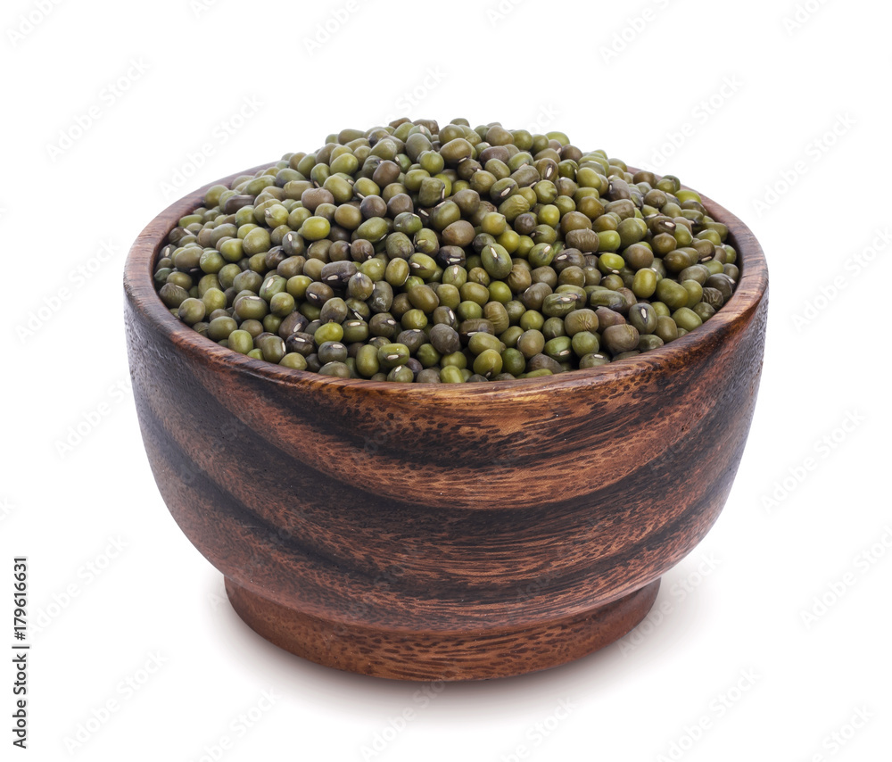 Green mung in wooden bowl isolated on white background Green mung in wooden bowl isolated on white background