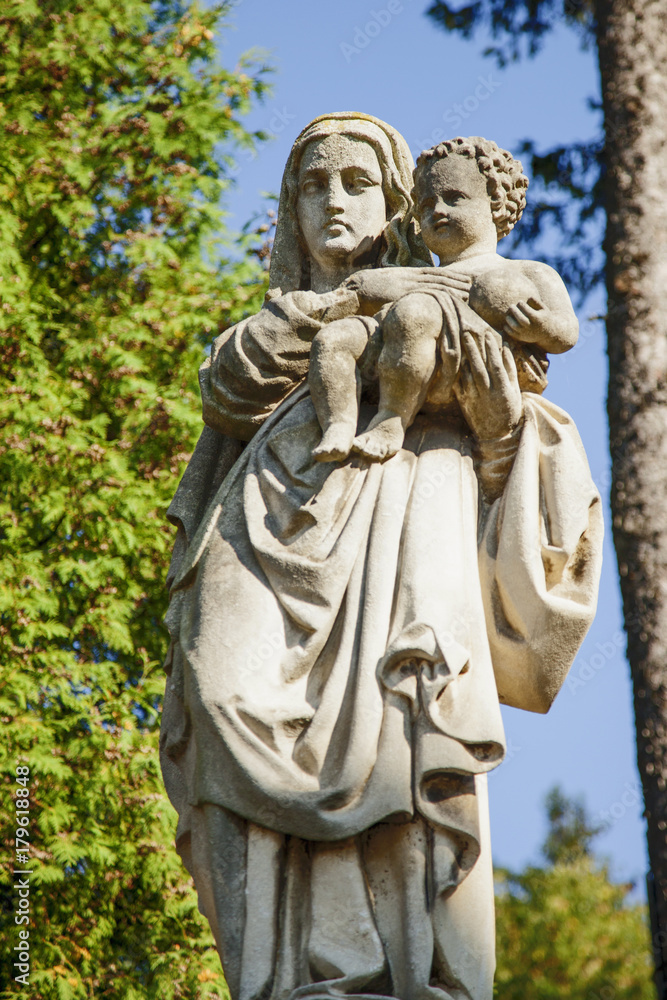 Fragment of ancient statue of the Virgin Mary with the baby Jesus Christ (Religion, faith, eternal life, God, the soul concept) Fragment of ancient statue of the Virgin Mary with the baby Jesus Christ (Religion, faith, eternal life, God, the soul concept)
