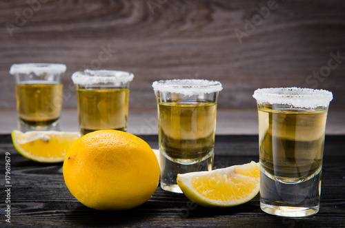 Tequila drink served in glasses with lime and salt