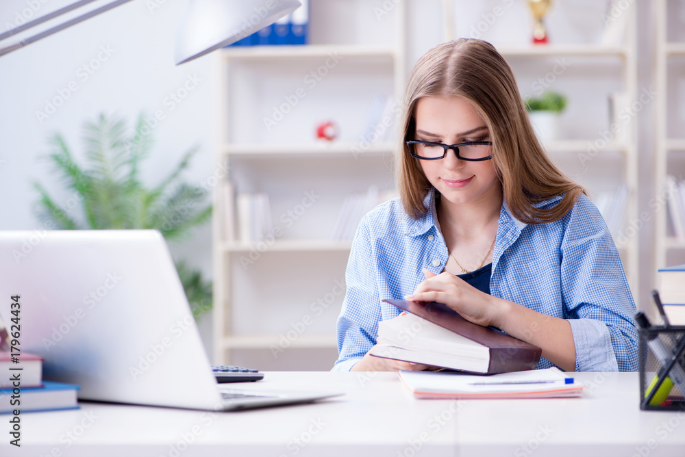 Young teenage female student preparing for exams at home Young teenage female student preparing for exams at home