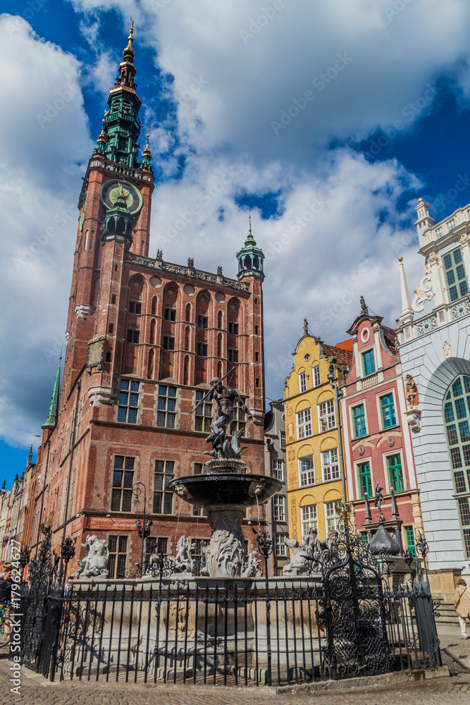 GDANSK, POLAND - SEPTEMBER 2, 2016: Neptune's fountain and the Town hall in Gdansk, Poland