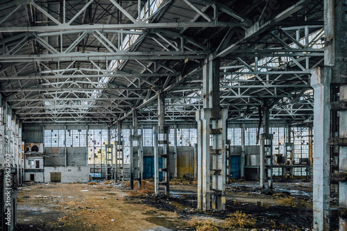 Abandoned large industrial hall with garbage. Voronezh excavator manufacturing factory