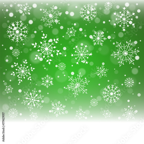 Christmas snowflakes and snowdrift on green background.