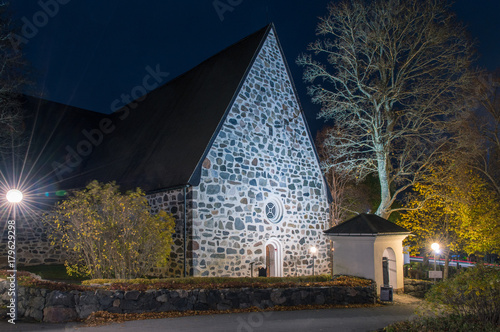 Värmdö kyrka på natten under Allhelgonahelgen photo