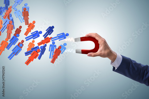 фотографія Businessman in recruitment concept with horseshoe magnet