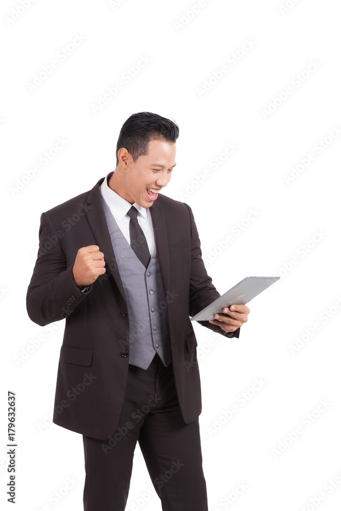 Businessman looking to tablet checking e-mail or shopping online on isolated background. Businessman looking to tablet checking e-mail or shopping online on isolated background.